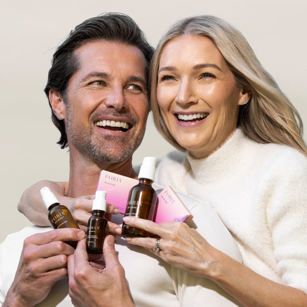Foria The Honeymoon Set Man and woman holding intimacy products together to spark sex life