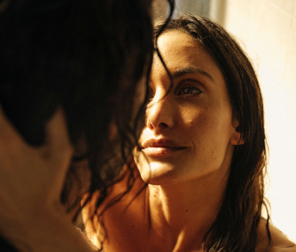 Foria, deeper connection and pleasure start here. Woman connecting with her partner. 